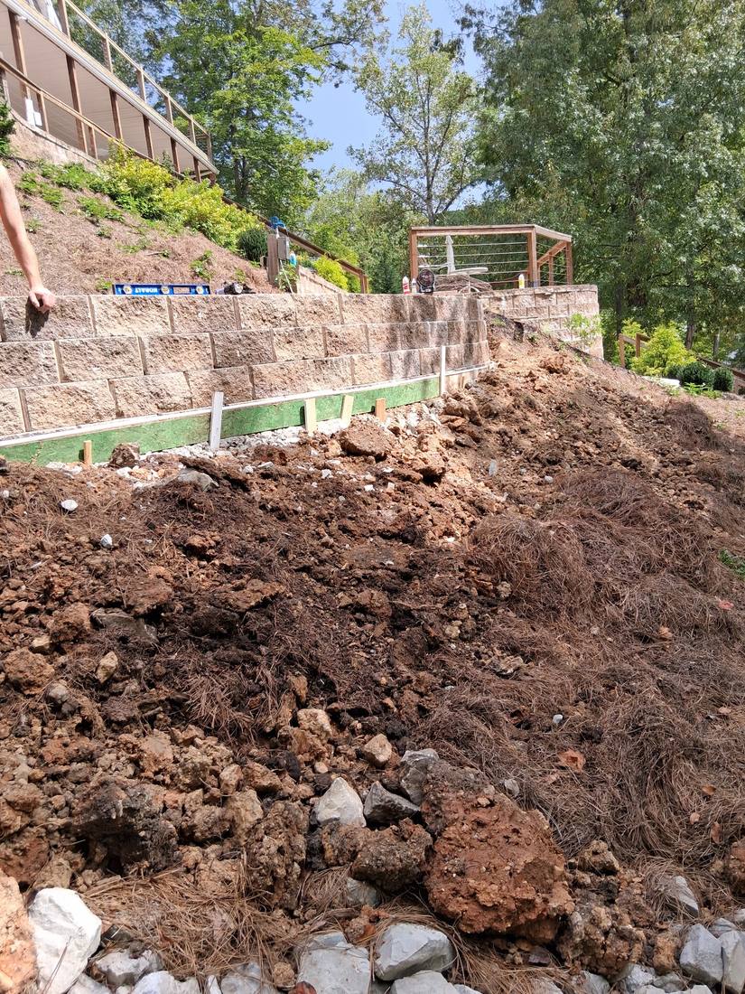 Retaining wall under construction with graded soil in Campbell County, TN